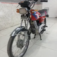 هندا 87 عروسک ، تعویض پلاک
