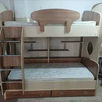 تخت دوطبقه همراه میز تحریر
