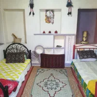 اجاره منزل سوئیت خانه مسافر سنتی اتاق حرم|اجارهٔ کوتاهمدت ویلا و باغ|شیراز, سیاه سنگ|دیوار