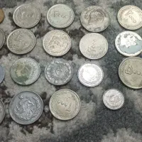 چند عدد سکه قدیمی شاهی هم رقم