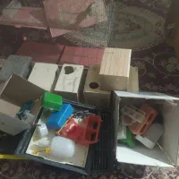 قفس پرنده با لونه و وسایل  مربوط به پرنده
