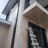 سنگکاری و کاشیکاری ساختمان کریم پور