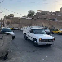 نیسان سفید ۸۳عروسک