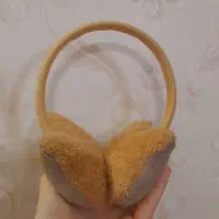 گوشگیر عروسکی|کفش و لباس بچه|مشهد, عامل|دیوار