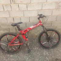 دوچرخه 26 تاشو رینگ اسپرت دوتا کمک فنر داره تمیز.