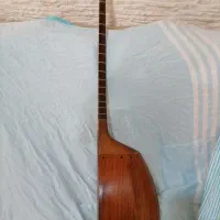 تنبور پاشنه ای از چوب توت|سازهای سنتی|کنگاور, |دیوار