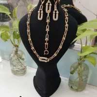 گردنبند دم وال دستبند کارتیر استیل موروارید ورساچ
