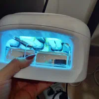 دستگاه یوی کاشت ناخن