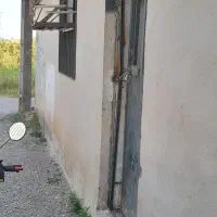 فروش  یک باب  خانه  ویلایی  همراه  مغازه  کوچک