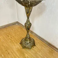 میوه خوری کنار سالنی برنز