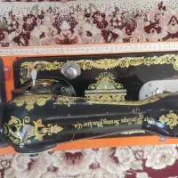 چرخ خیاطی رو شیر کار کرده