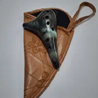 اکارینا|سازهای بادی|ری, علایین|دیوار