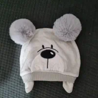 کلاه و تعدادی لباس بچه