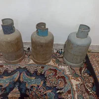 ۳ عدد کپسول بوتان در حد نو و ۳ عدد بخاری گازی