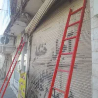 کرکره ..سازی تعمیرات فنرکرکره درب اتوماتیک برقی