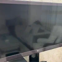 تلویزیون LED سه بعدی LG همراه با میز ال ای دی