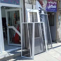 پنجره دوجداره و توری پلیسه