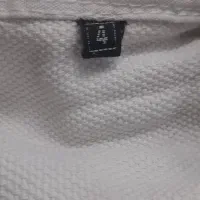 لباس باشگاه با کمربند|لباس|قم, انسجام|دیوار