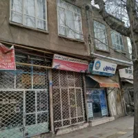 دومغازه تجاری و منزل مسکونی خیابان سیروس(انقلاب)