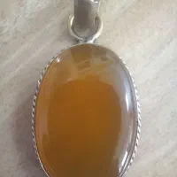 انگشتر عقیق سیاه و گردنبند زرد