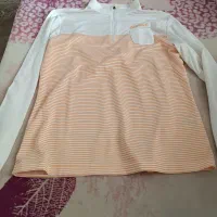 تعدادی پیراهن نیم زیپ کوهنوردی دو عدد شلوار