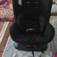 روروئک ،صندلی ماشین و تخت کنار مادر