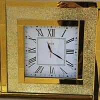 ساعت دیوار طلایی و نقره ای