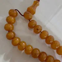 تعدادی تسبیح سندلوس و کهربا موجود تماس بگیرید