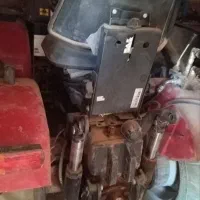 تراکتور کمر شکن با وسایل کشاورزی