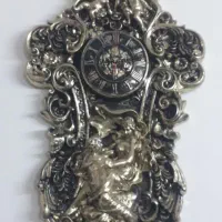 ساعت پلیستری دیواری  تزینی و  ۱موتور ساعت اضافه