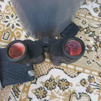 یک عدد دوربین شکاری و دو عدد چاقوی قدیمی