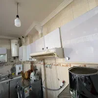 کابینت تمام فلز با هود و سنگ روی کابینت