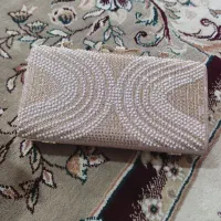 دسته گل و کیف مجلسی