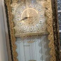 ساعت برنزی ایستاده