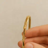 النگوی فیوژن مدل چرخشی و طرح شانلی کپی طلا رزگلد