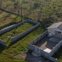 فروش-قطعه-زمین-299متری-بادیوار-بلند-چسبیده-به-بافت