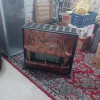 بخاری،، کمد شیشه ای،، ساعت دکوری