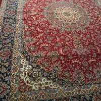 فرش ماشینی سلیمان ۹ متری قرمز رنگ