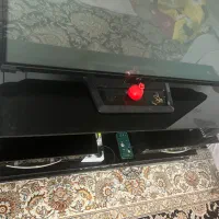 میز تلویزیون شیشه ای سایزبزرگ محکم