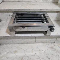 کباب پز استیل ۴ شعله تمیز و سالم به شرط در حد نو