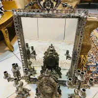 آینه شعمدان و ساعت