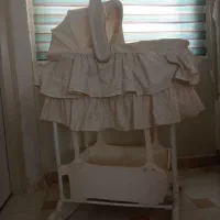 گهواره تخت کنار مادر