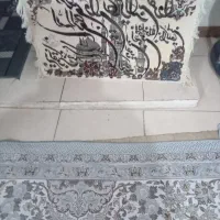 یک عدد مجسمه و یک عدد قالیچه