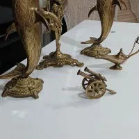 دکوری برنزی دولفینهاتوپرهستندحکاکی شده