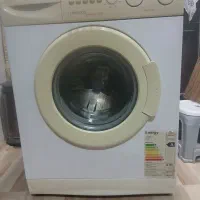 لباسشویی کنوود ب شرط سلامت|ماشین لباسشویی و خشک‌کن لباس|رشت, استقامت ۱|دیوار