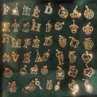 پلاک طلای حروف و کادویی