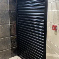 کرکره برقی و دوربین مداربسته