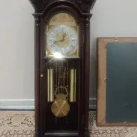 ساعت دیواری آونگ دار