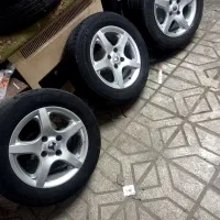 ۴ حلقه رینگ و لاستیک ۵ پر سایز ۱۵ لاستیک ۶۰ درصد|قطعات یدکی و لوازم جانبی|مشهد, سرافرازان|دیوار