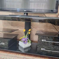 میز شیشه ای تلویزیون